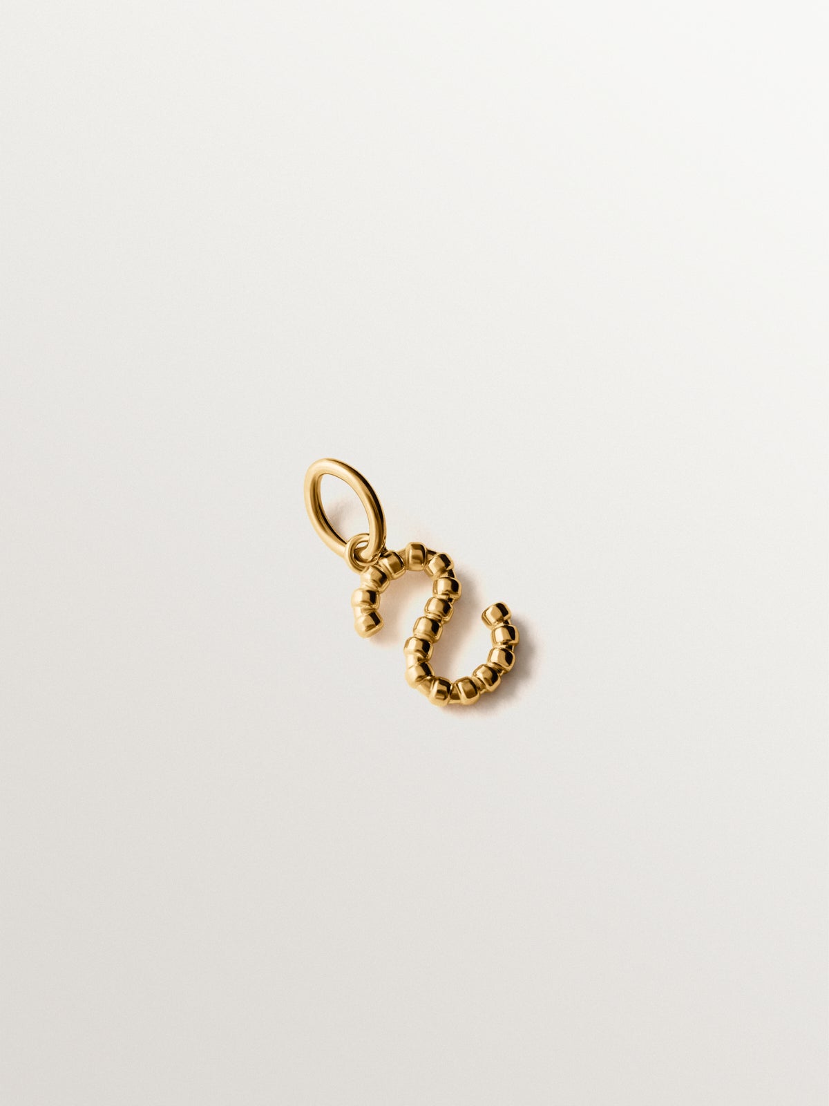 925 silver charm plated in 18K yellow gold with letter S and dial motifs