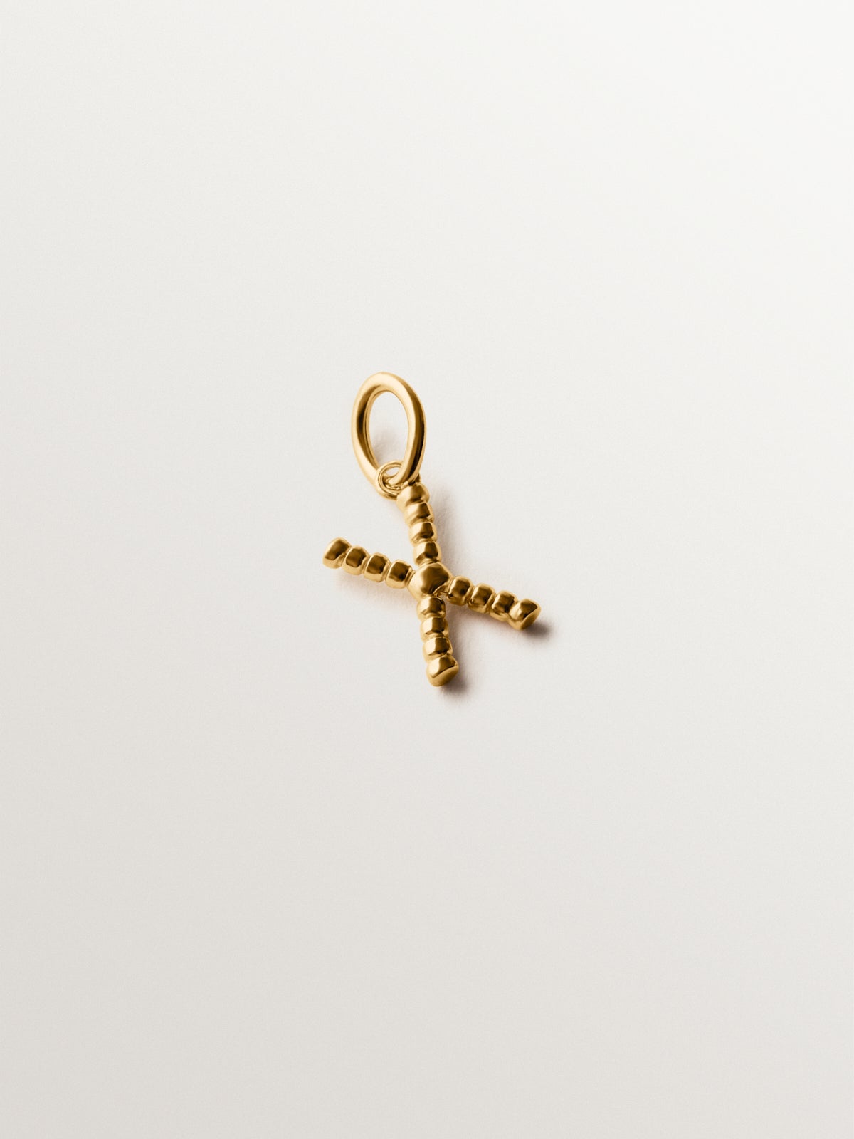 925 silver charm plated in 18K yellow gold with letter X and dial motifs