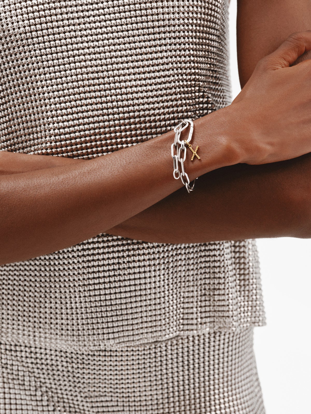 925 silver charm plated in 18K yellow gold with letter X and dial motifs