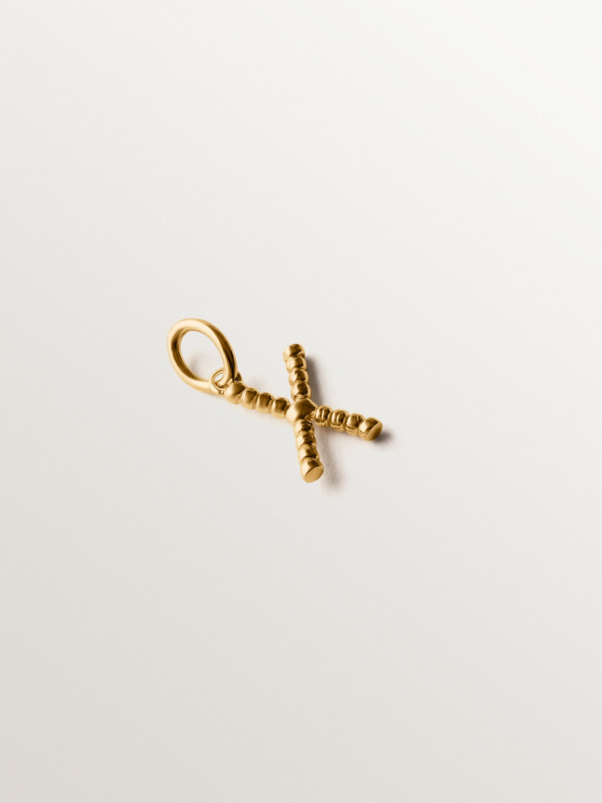 925 silver charm plated in 18K yellow gold with letter X and dial motifs