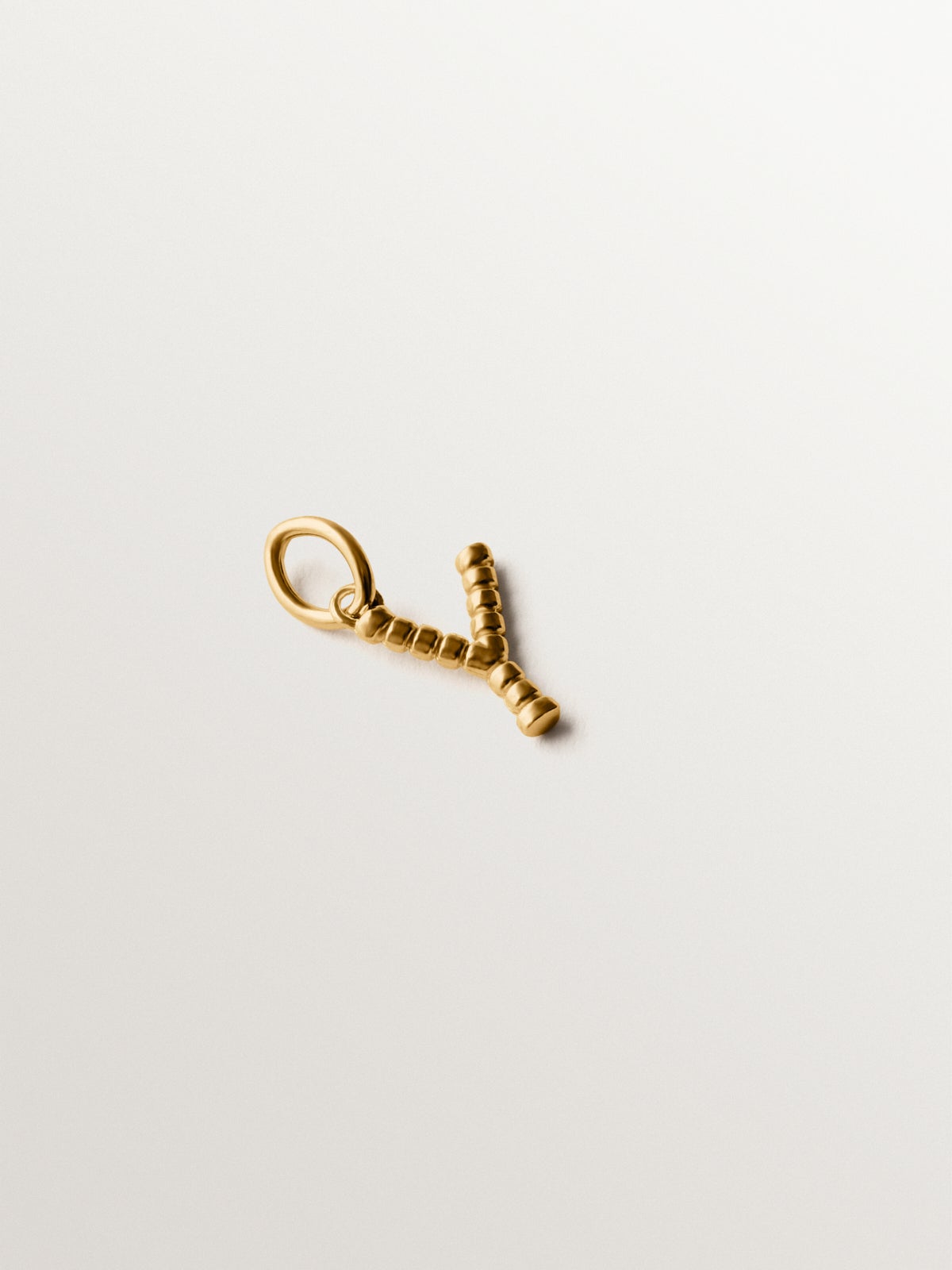 925 silver charm plated in 18K yellow gold with Y letter and dial motifs