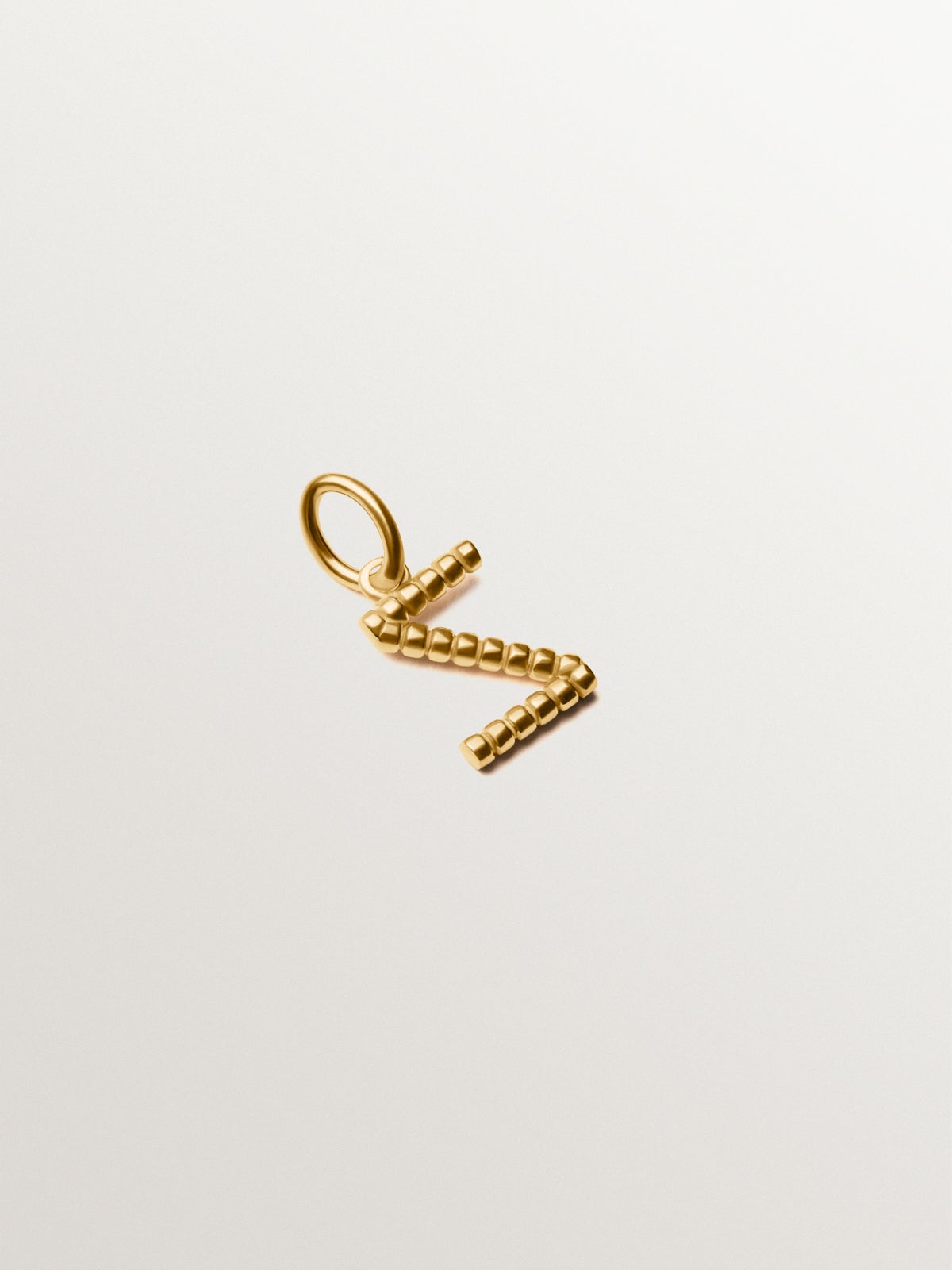 925 silver charm plated in 18K yellow gold with letter Z and dial motifs
