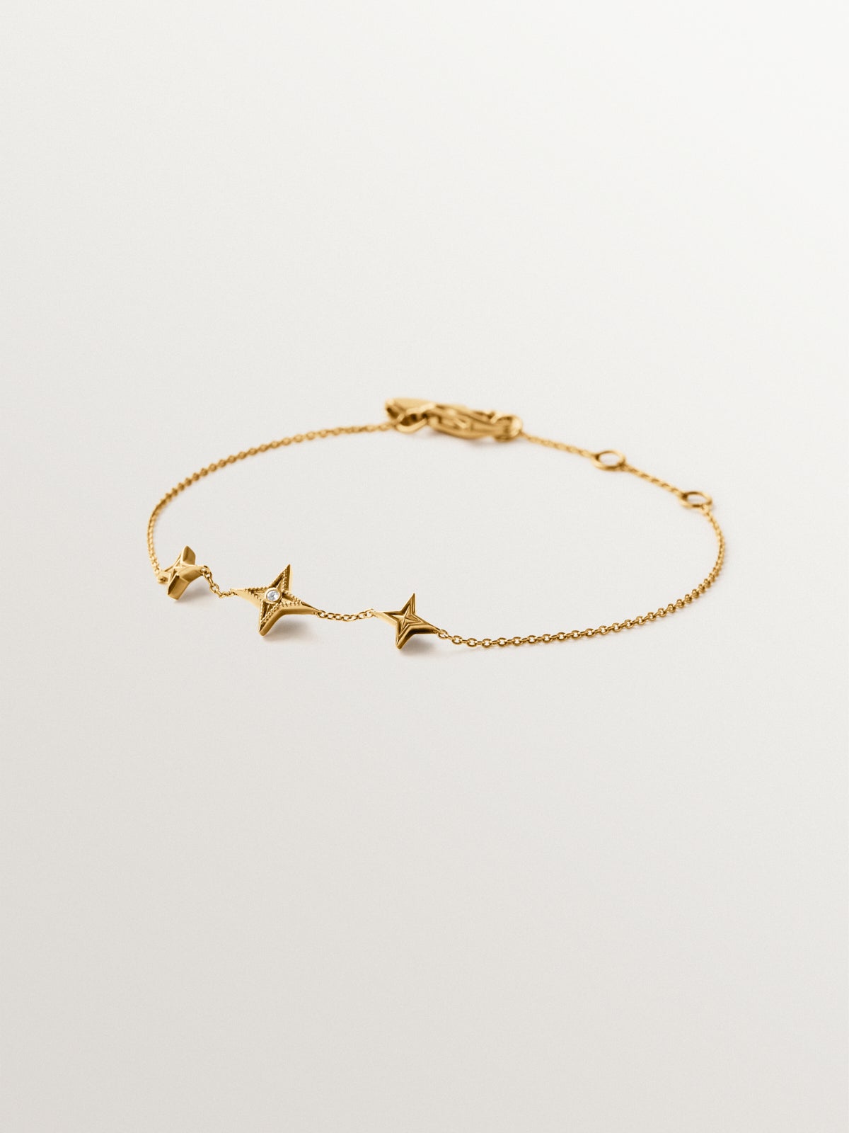 925 silver bracelet plated in 18K yellow gold with white topaz and star shape