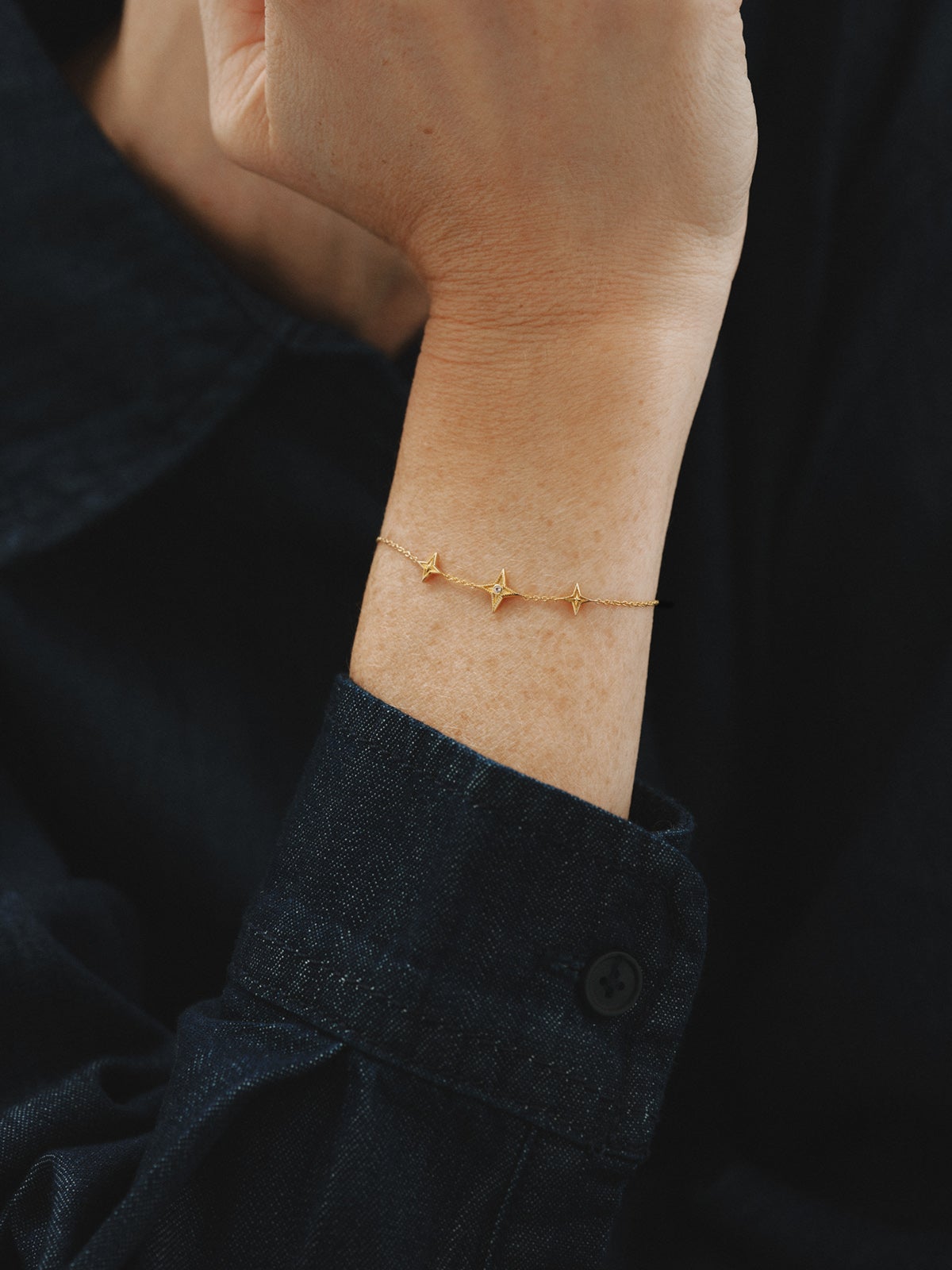 925 silver bracelet plated in 18K yellow gold with white topaz and star shape