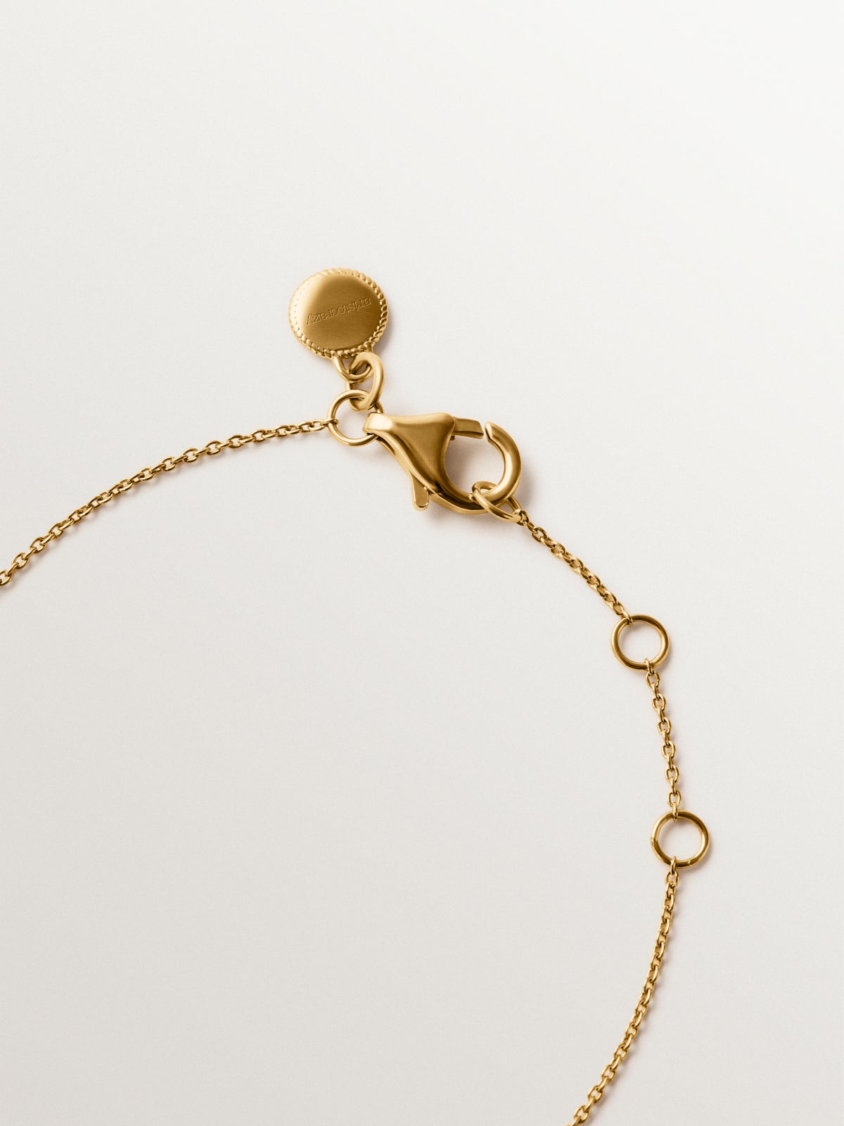 925 silver bracelet plated in 18K yellow gold with white topaz and star shape