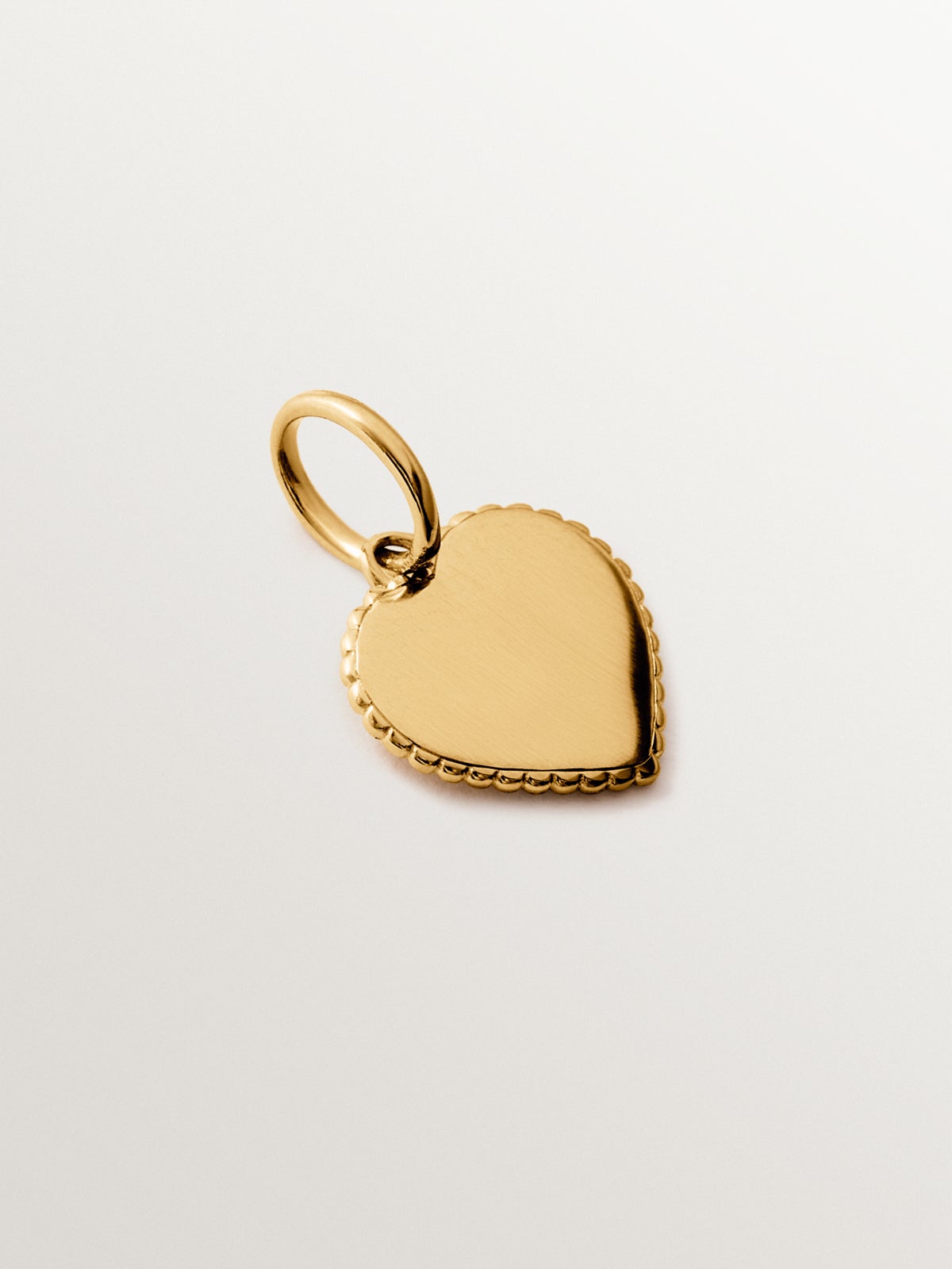Heart charm in silver plated in 18K yellow gold