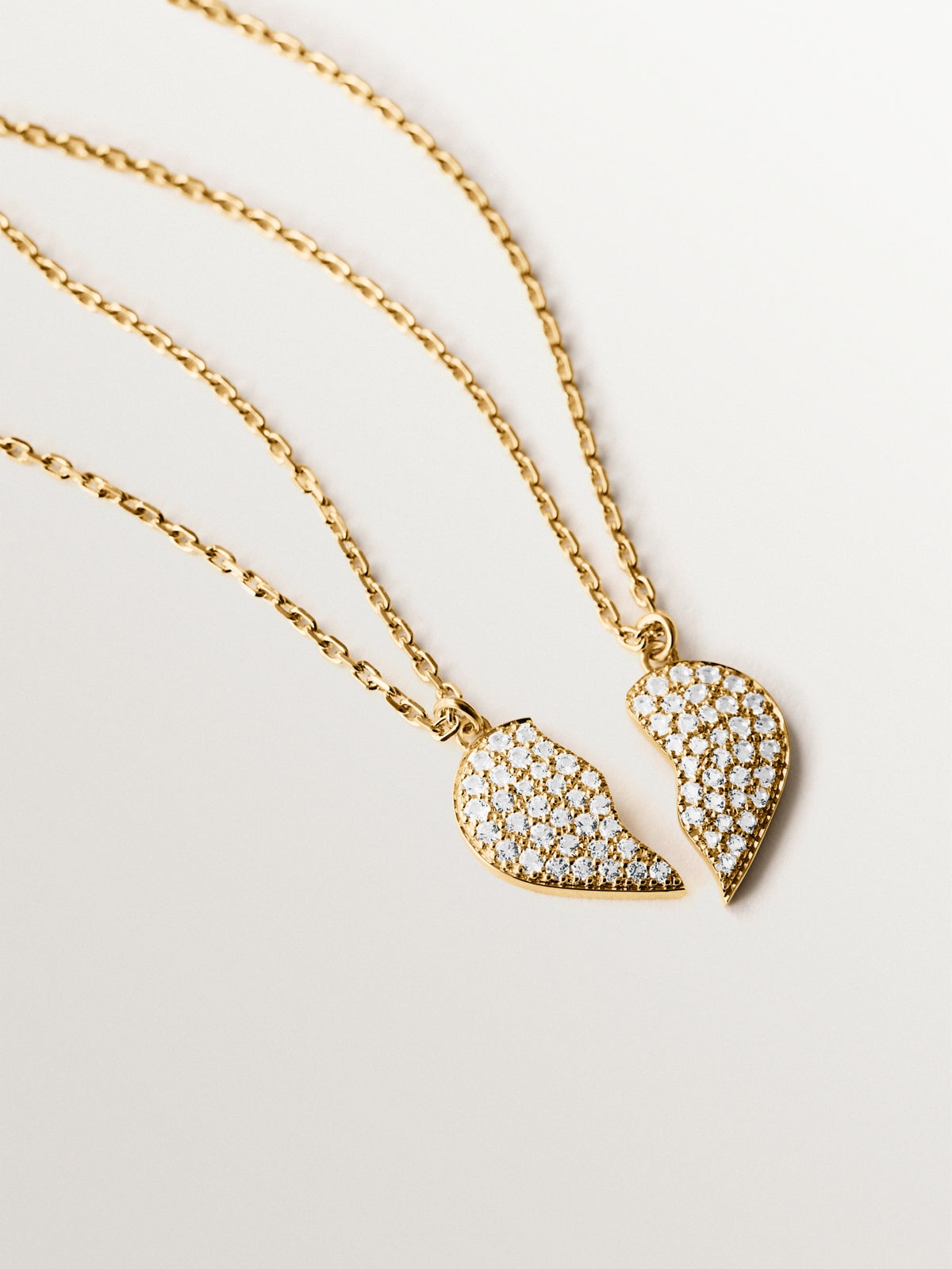 18K yellow gold plated silver pendant, white topaz and split heart shape