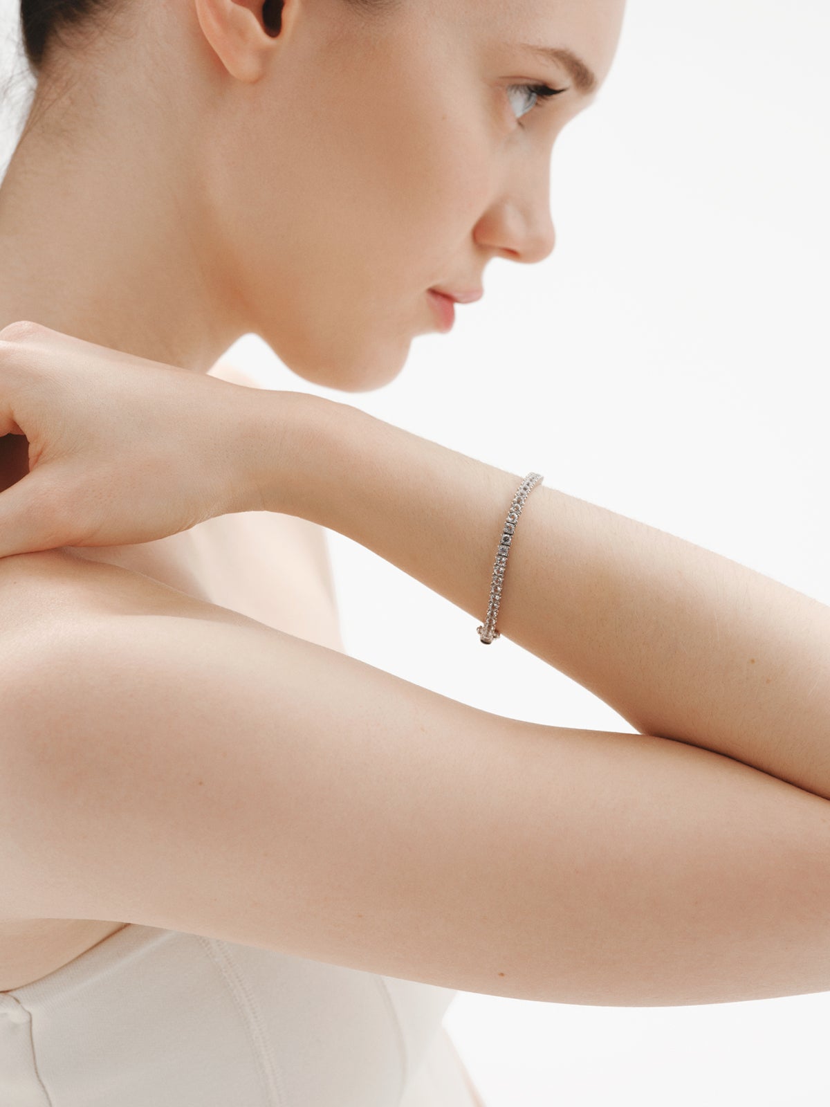Thick rivière bracelet in 925 silver with white topaz