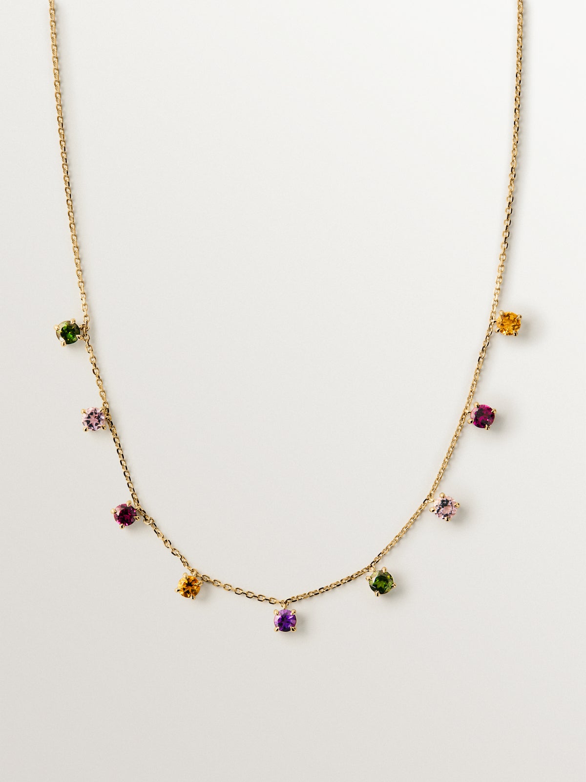 9K yellow gold necklace with pink and black amethysts, green tourmalines, orange citrine and rhodoliths