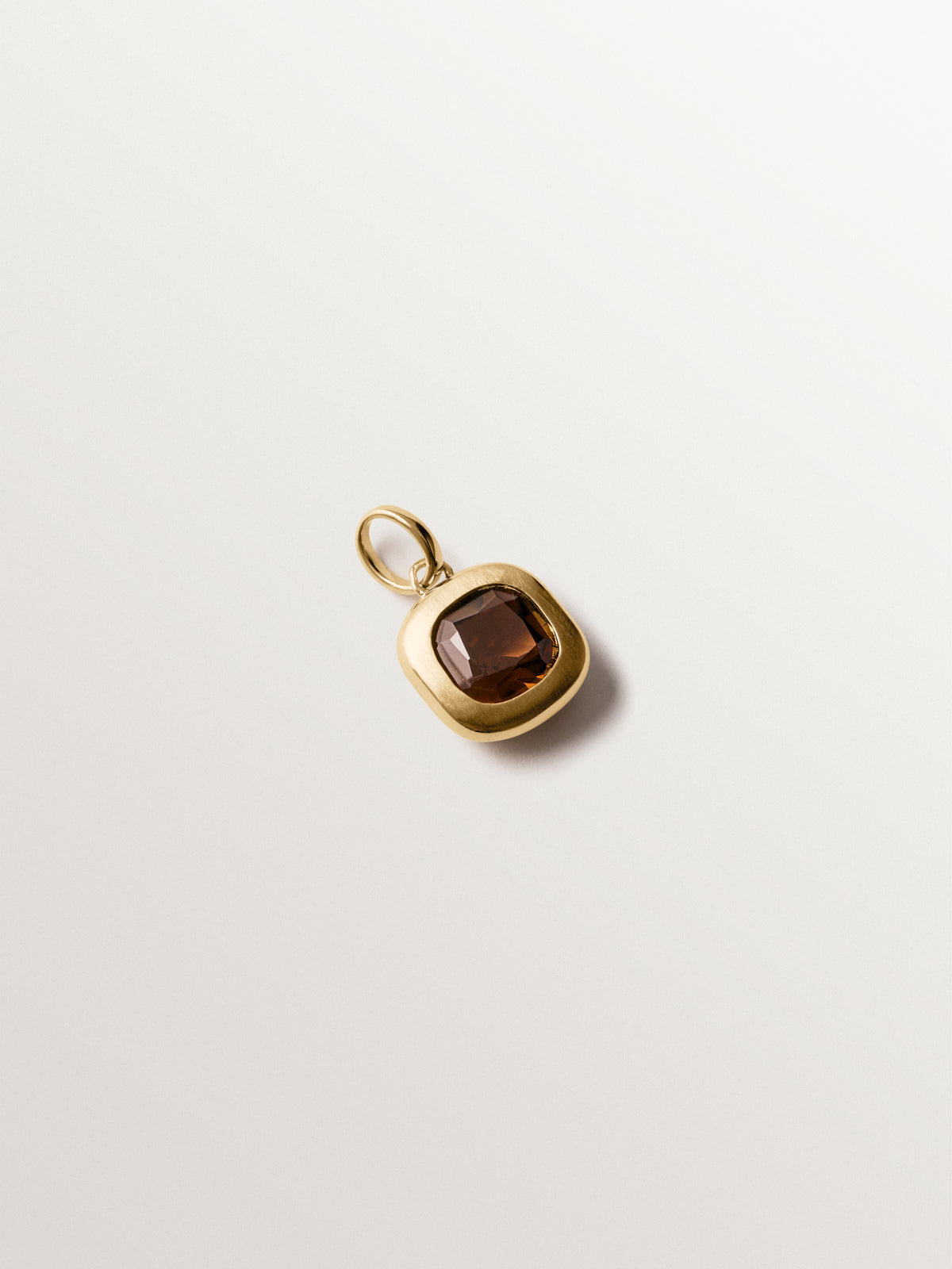 925 silver charm plated in 18K yellow gold with brown topaz