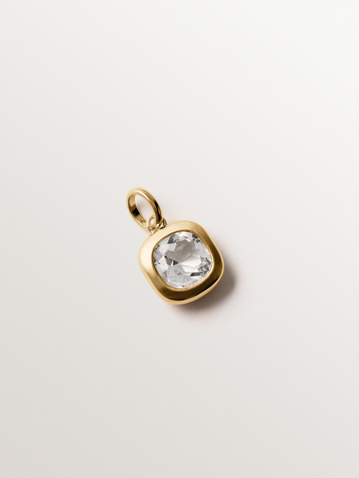 925 silver charm plated in 18K yellow gold with sky blue topaz