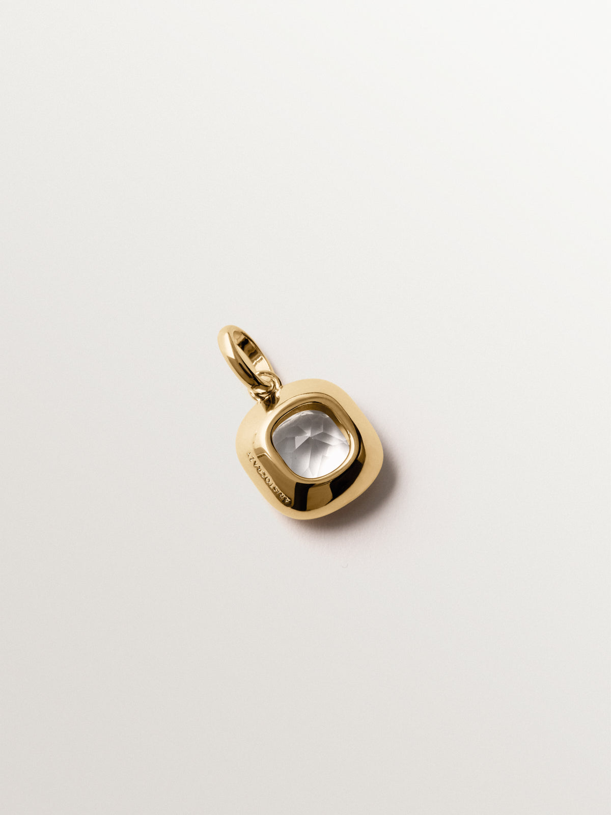 925 silver charm plated in 18K yellow gold with sky blue topaz
