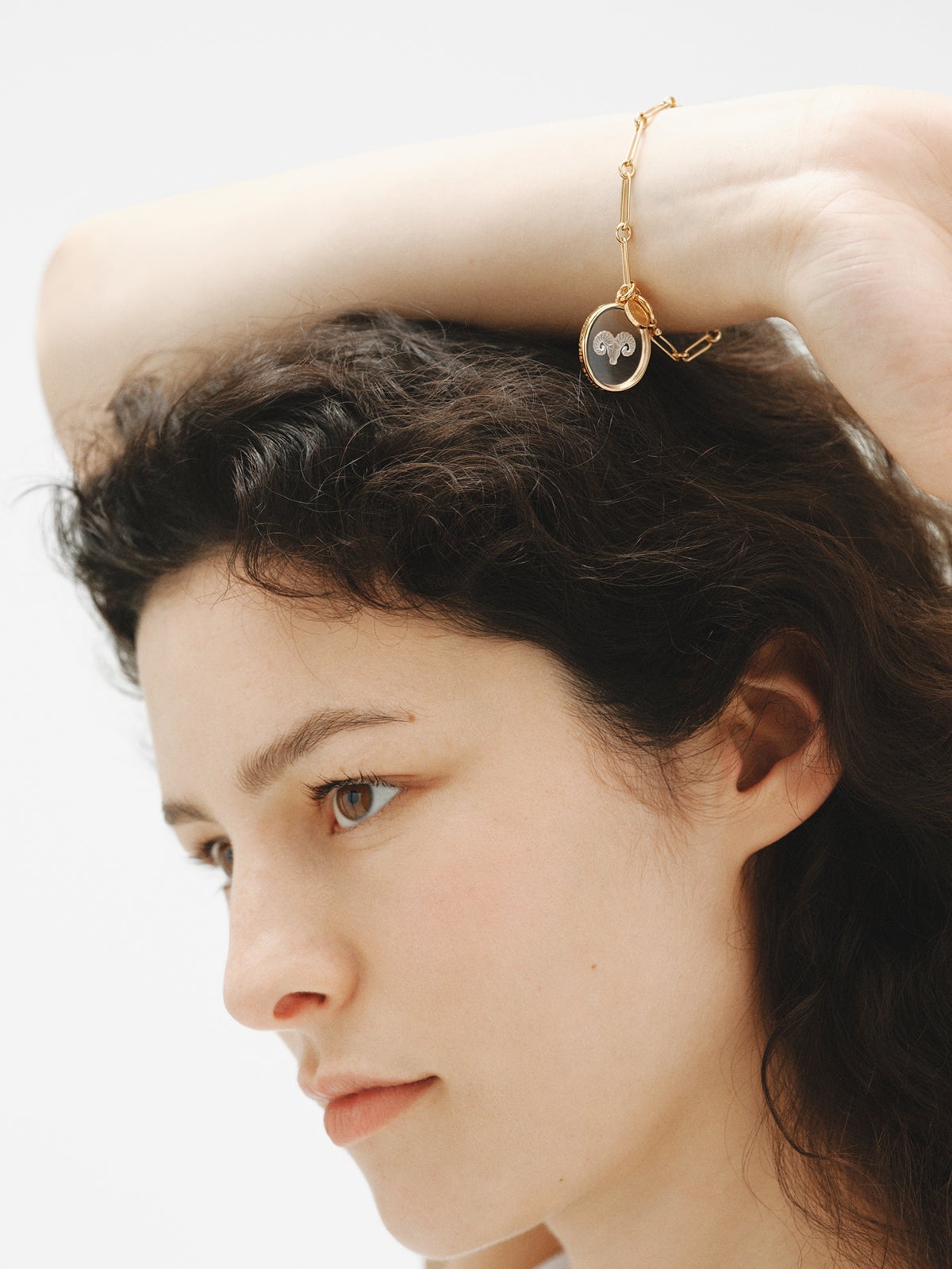 Aries charm in 925 silver plated in 18K yellow gold and rock cirstal
