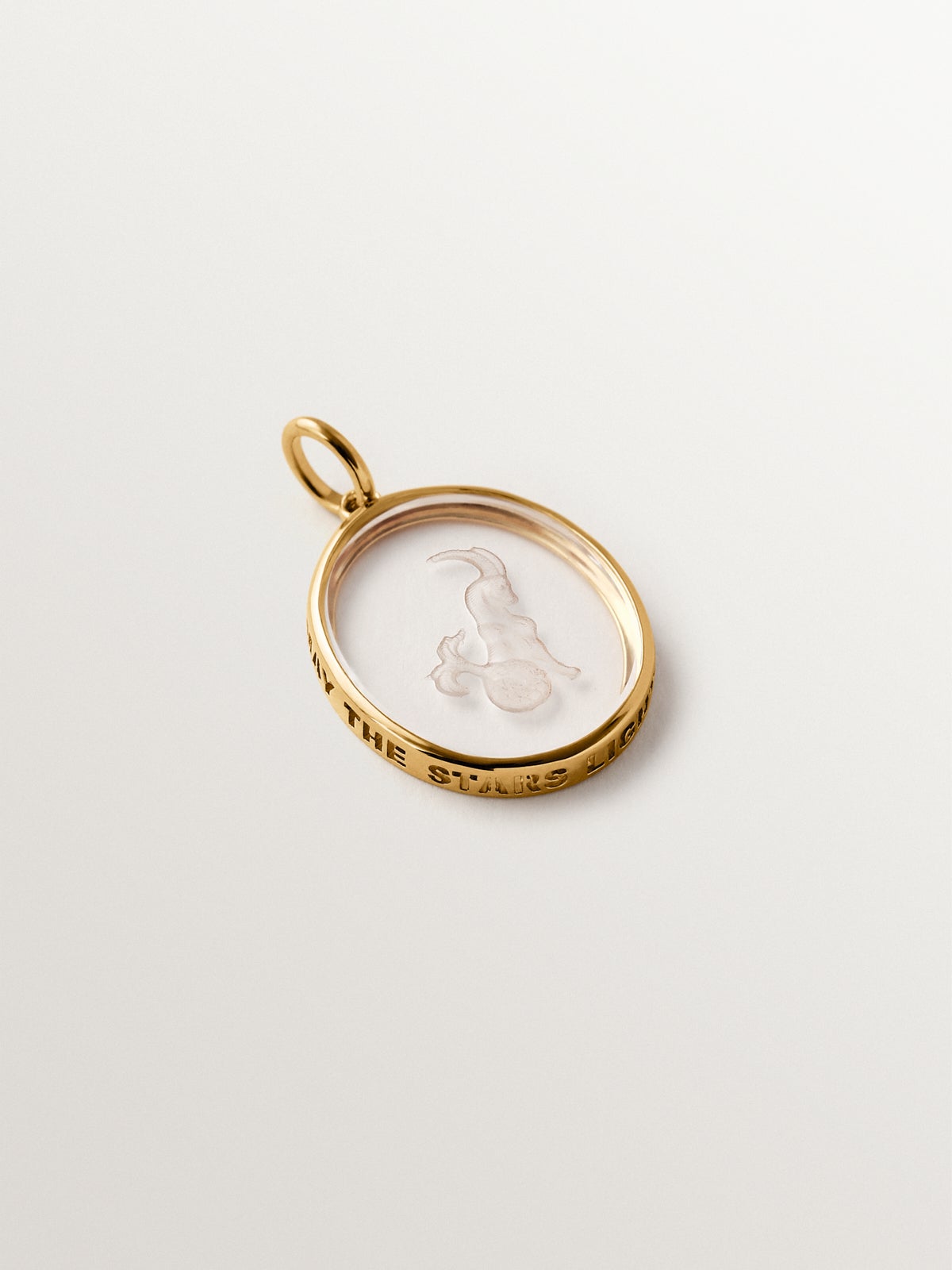 Carpricorn charm in 925 silver plated in 18K yellow gold and rock crystal