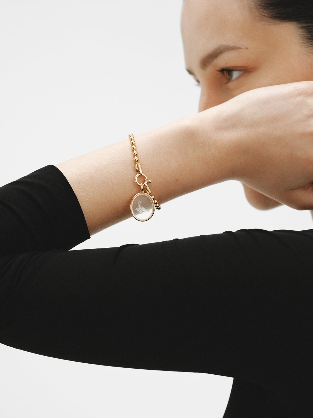Scorpio charm in 925 silver plated in 18K yellow gold and rock crystal