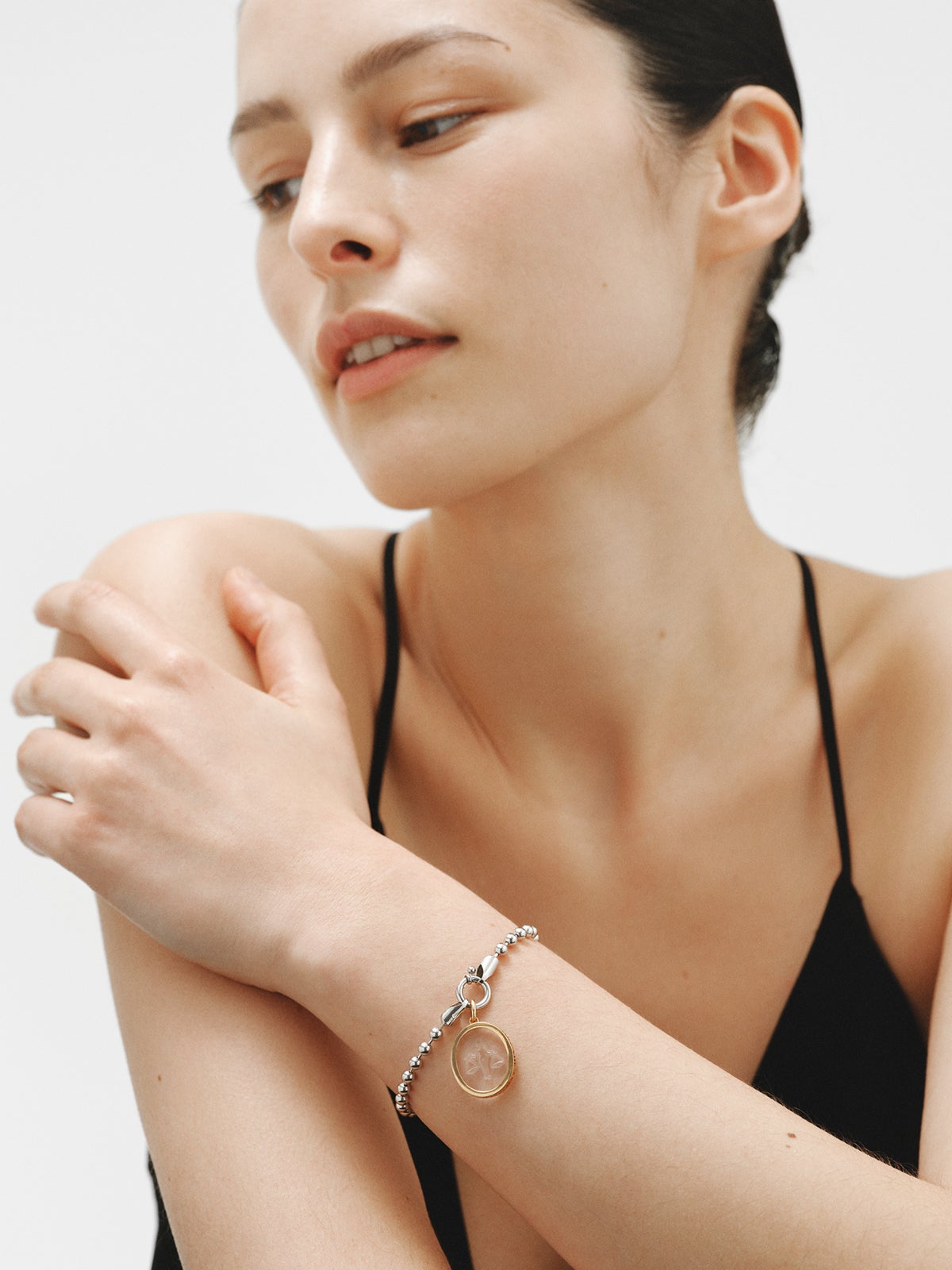 Libra charm in 925 silver plated in 18K yellow gold and rock crystal