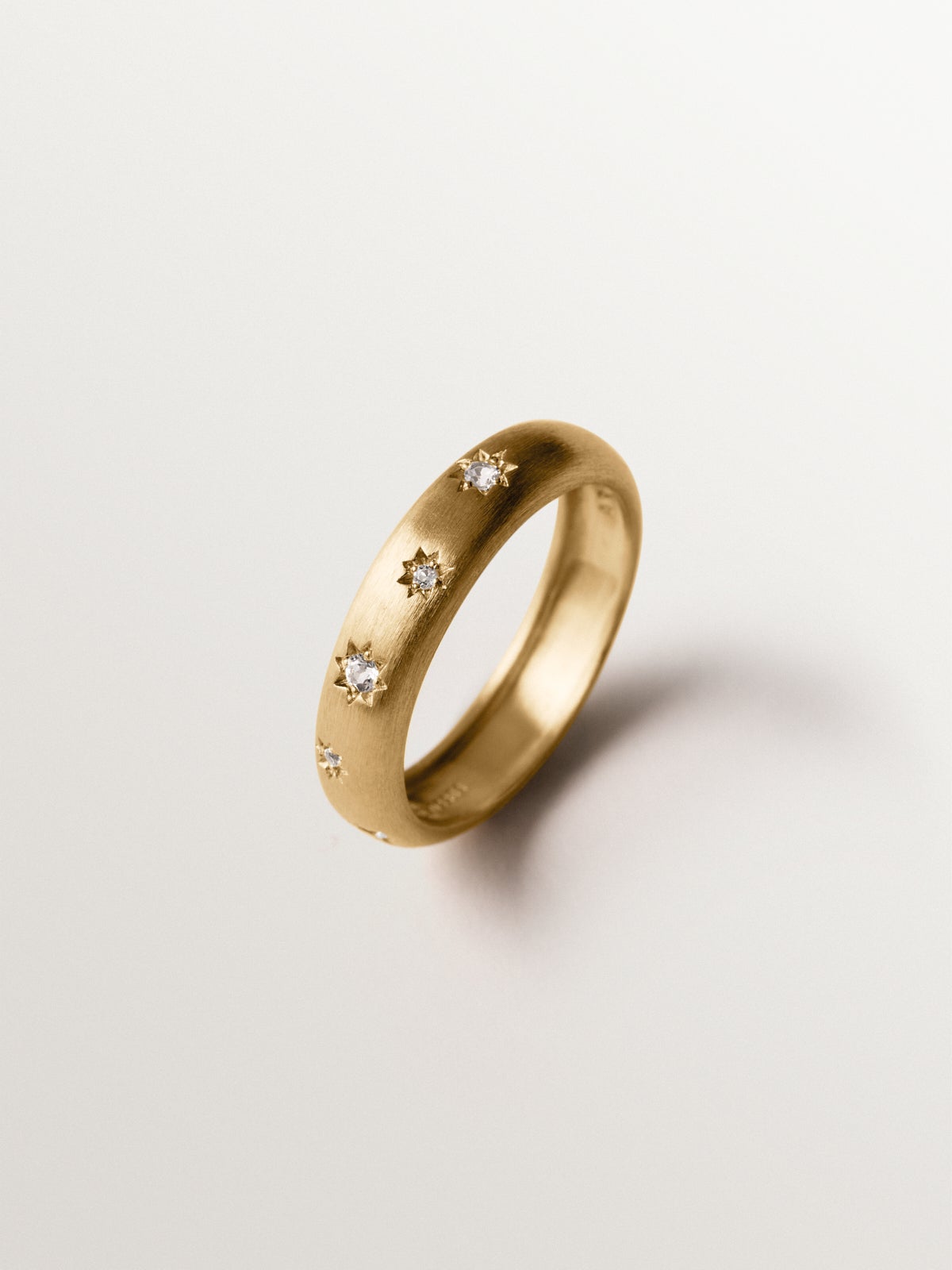 925 silver ring plated in 18K yellow gold with white topaz