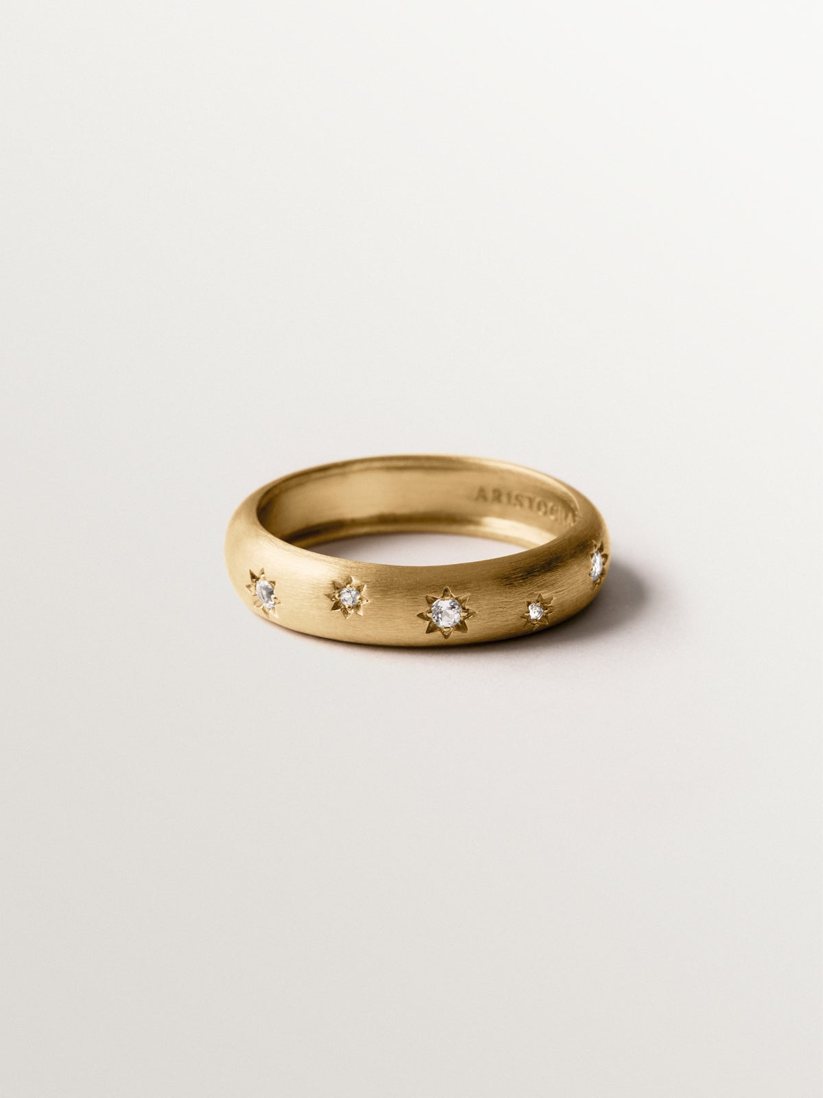 925 silver ring plated in 18K yellow gold with white topaz