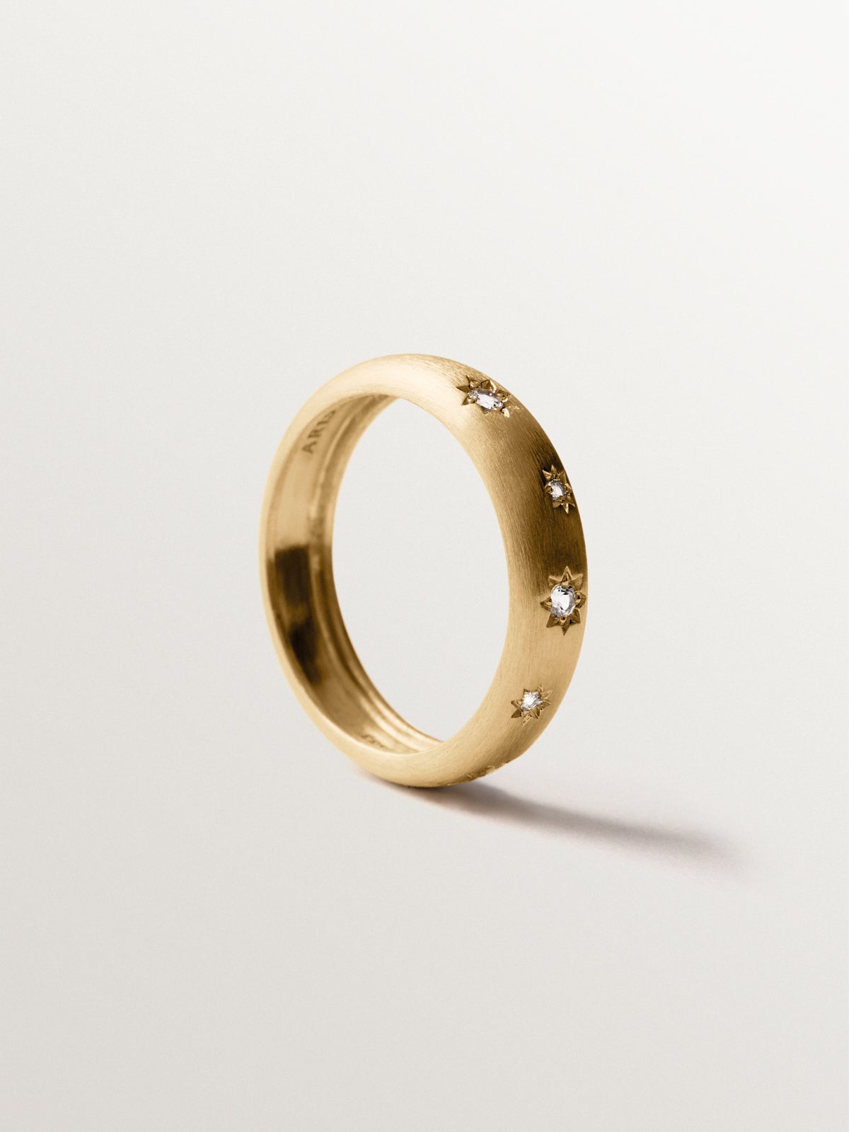 925 silver ring plated in 18K yellow gold with white topaz