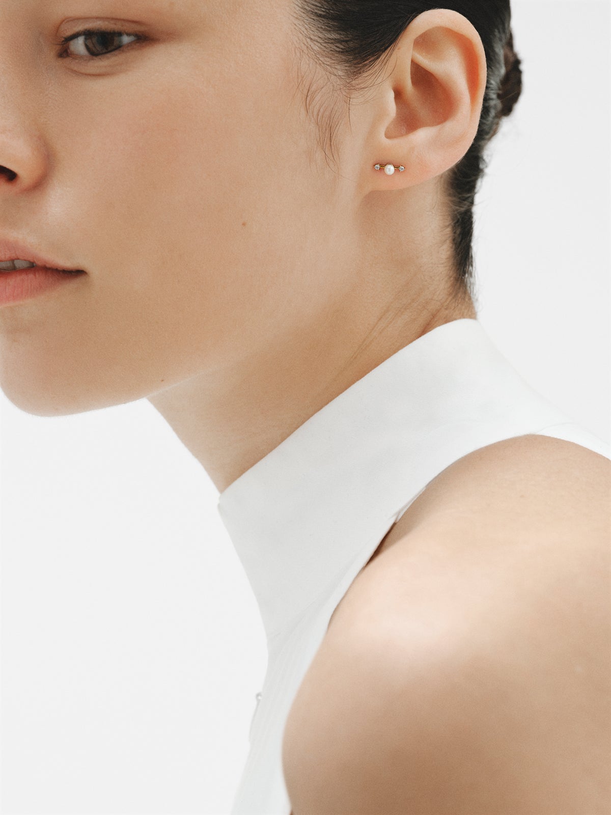 925 silver earrings plated in 18K yellow gold with pearls and white topaz