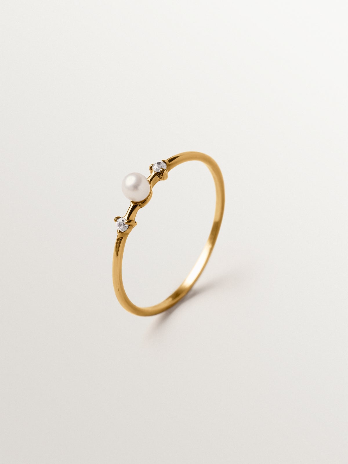 925 silver ring plated in 18K yellow gold with pearl and white topaz