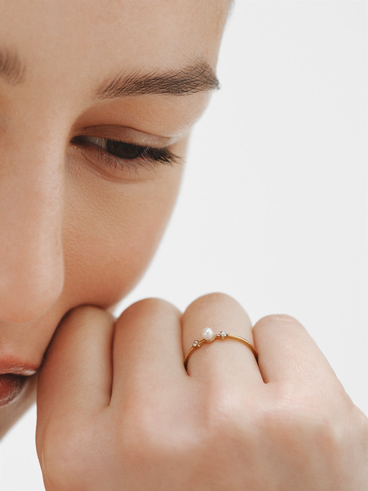 925 silver ring plated in 18K yellow gold with pearl and white topaz