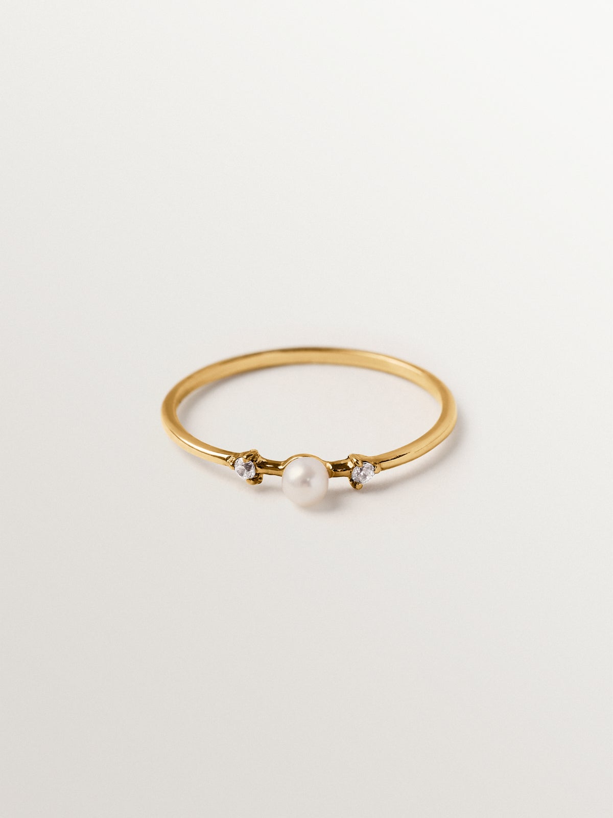925 silver ring plated in 18K yellow gold with pearl and white topaz