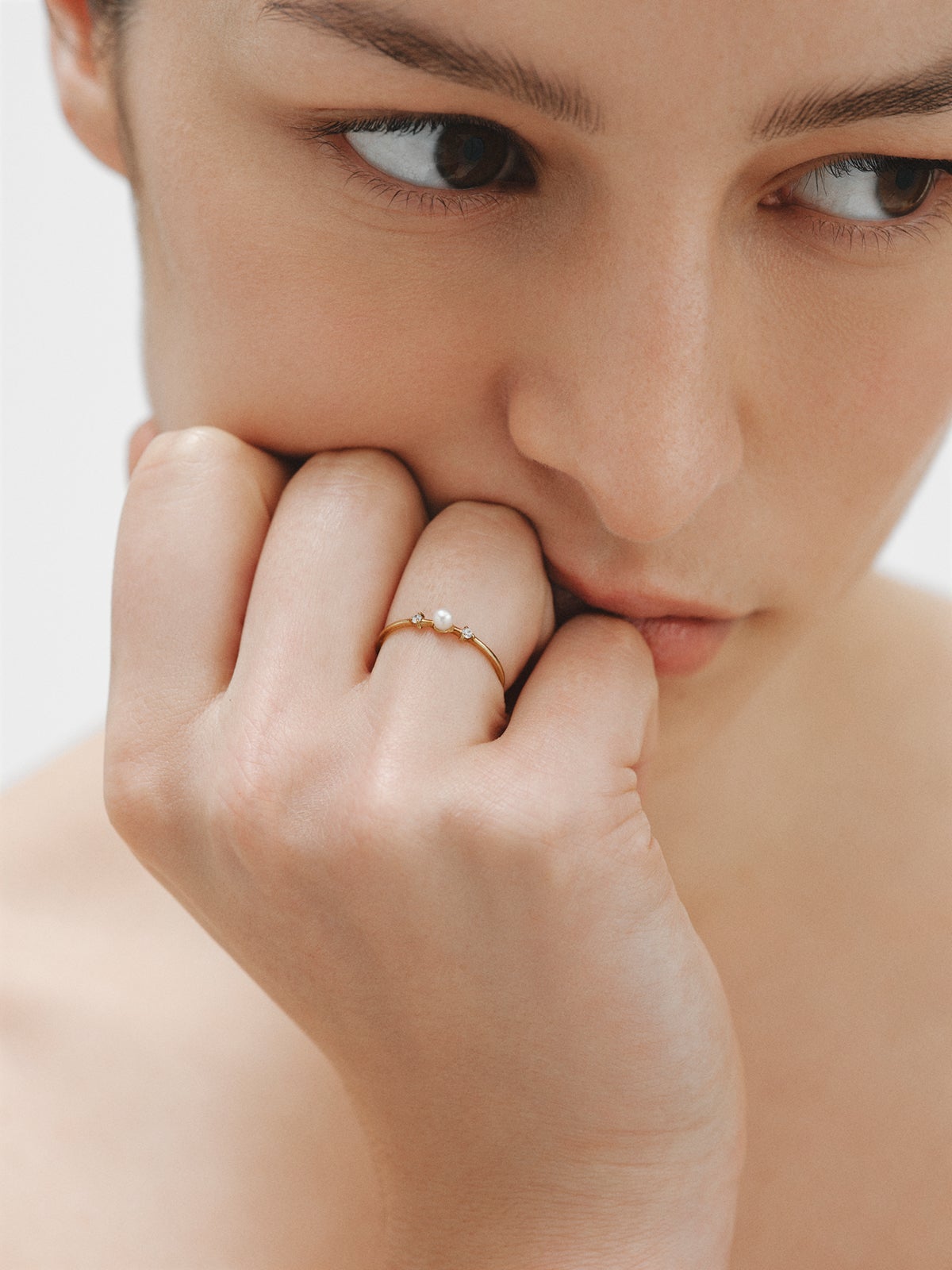 925 silver ring plated in 18K yellow gold with pearl and white topaz