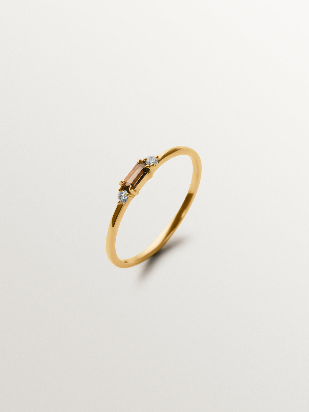 9K yellow gold ring with diamonds and brown quartz