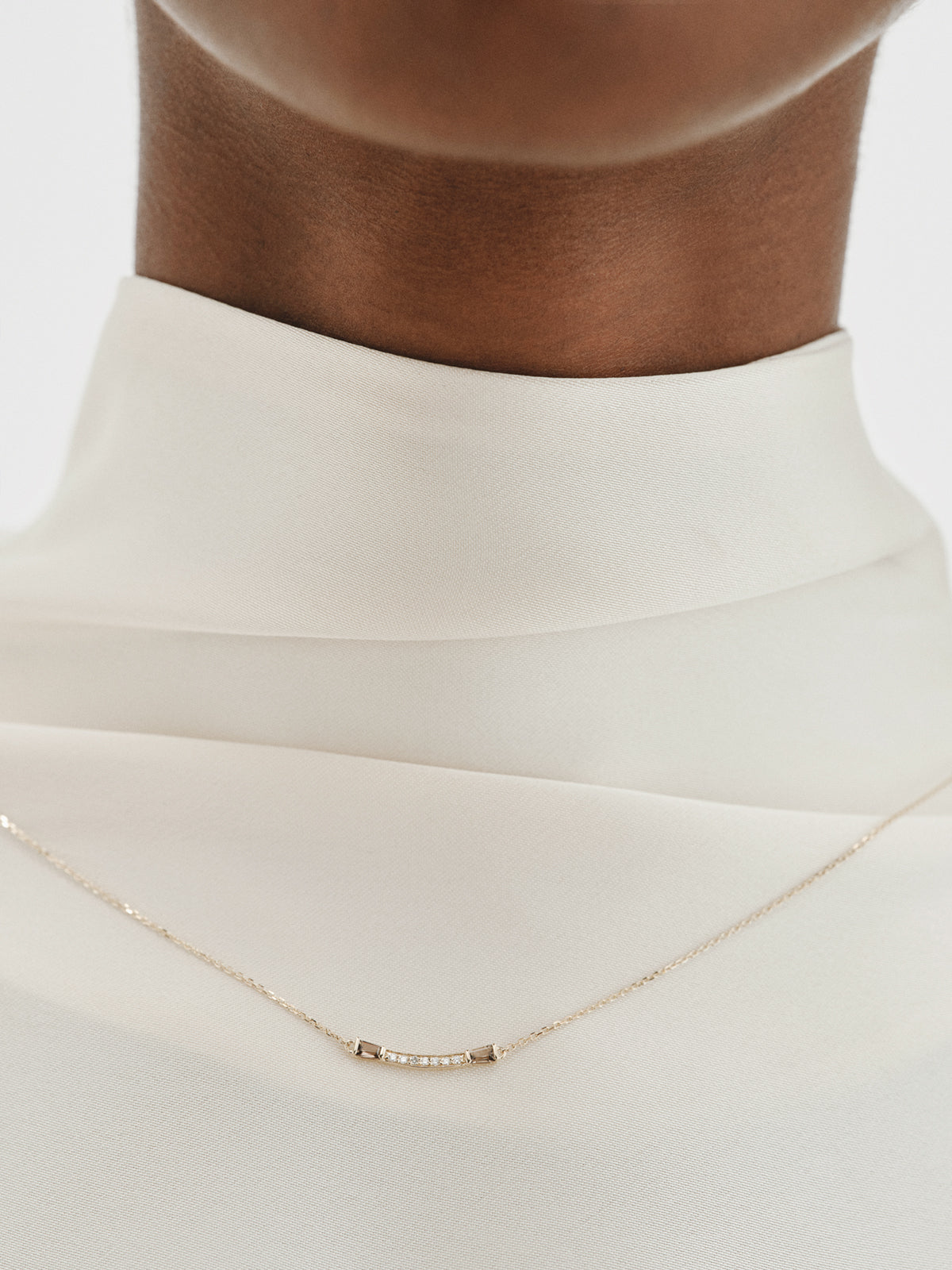 9K yellow gold necklace with diamonds and brown quartz