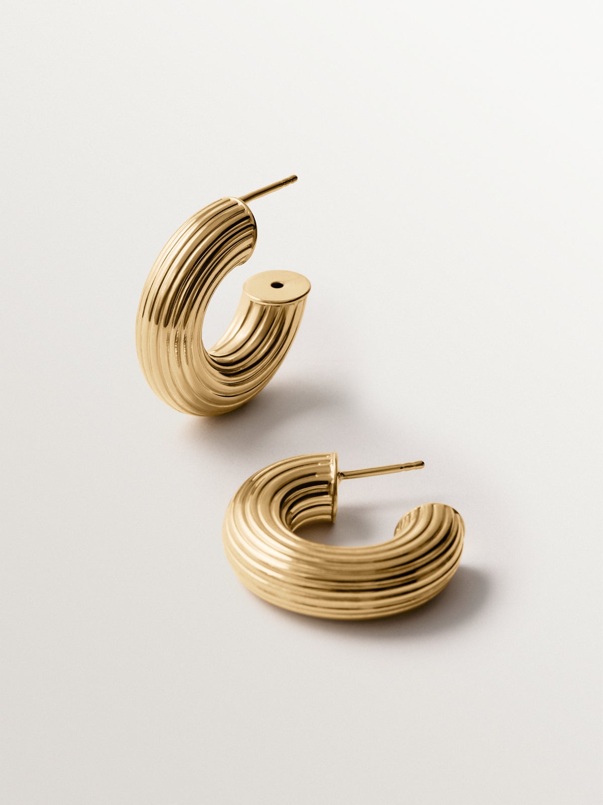 925 silver hoop earrings plated in 18K yellow gold with texture