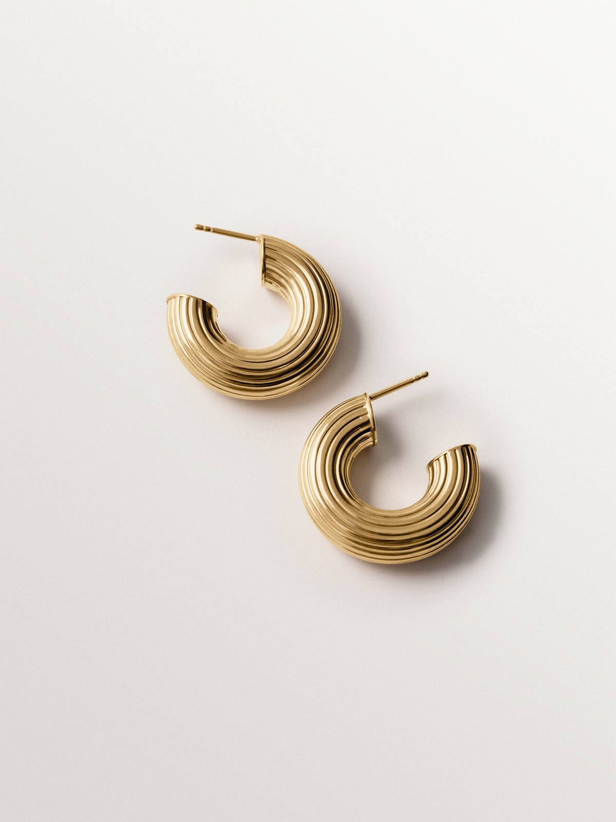 925 silver hoop earrings plated in 18K yellow gold with texture