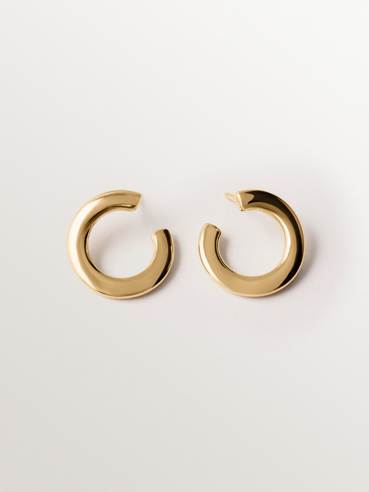 925 silver hoop earrings plated in 18K yellow gold with irregular shape
