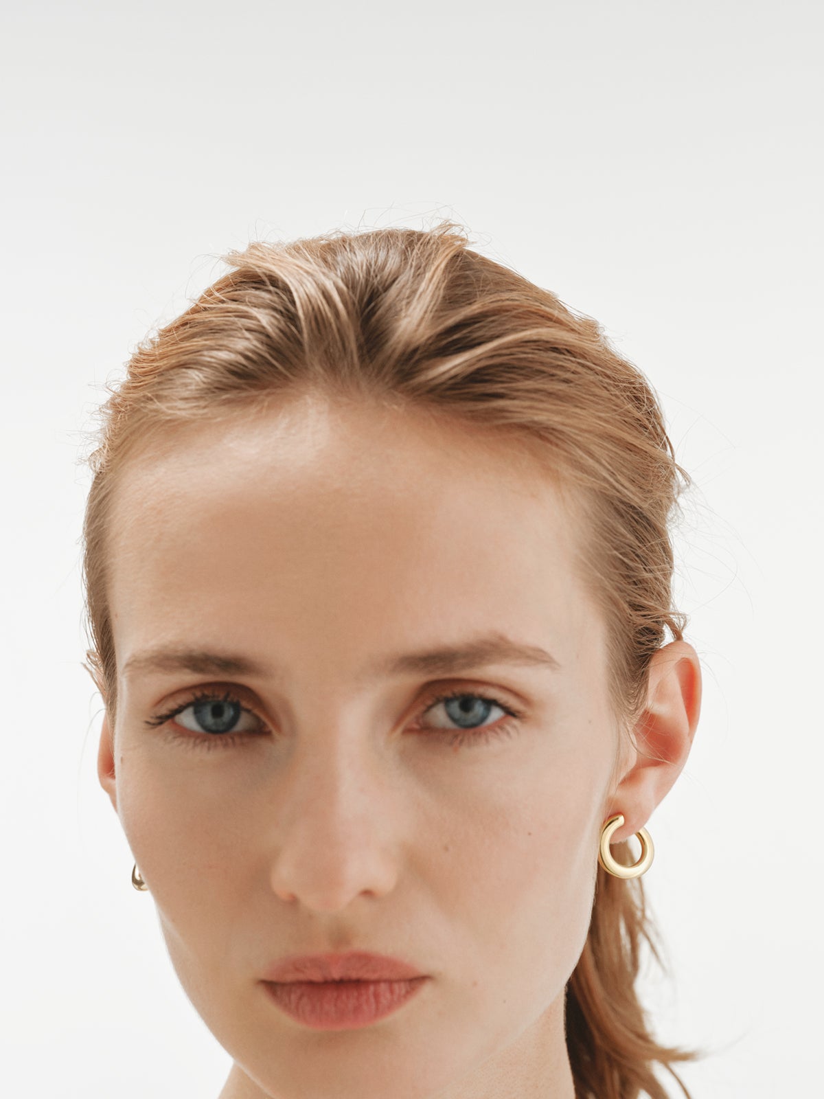 925 silver hoop earrings plated in 18K yellow gold with irregular shape