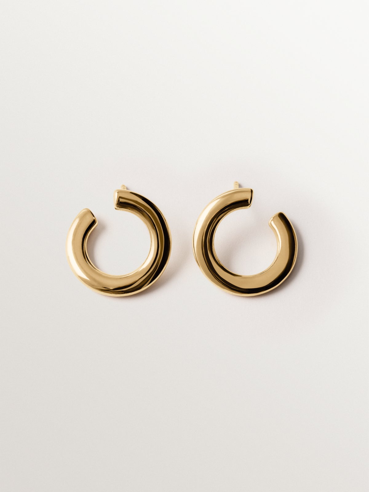925 silver hoop earrings plated in 18K yellow gold with irregular shape