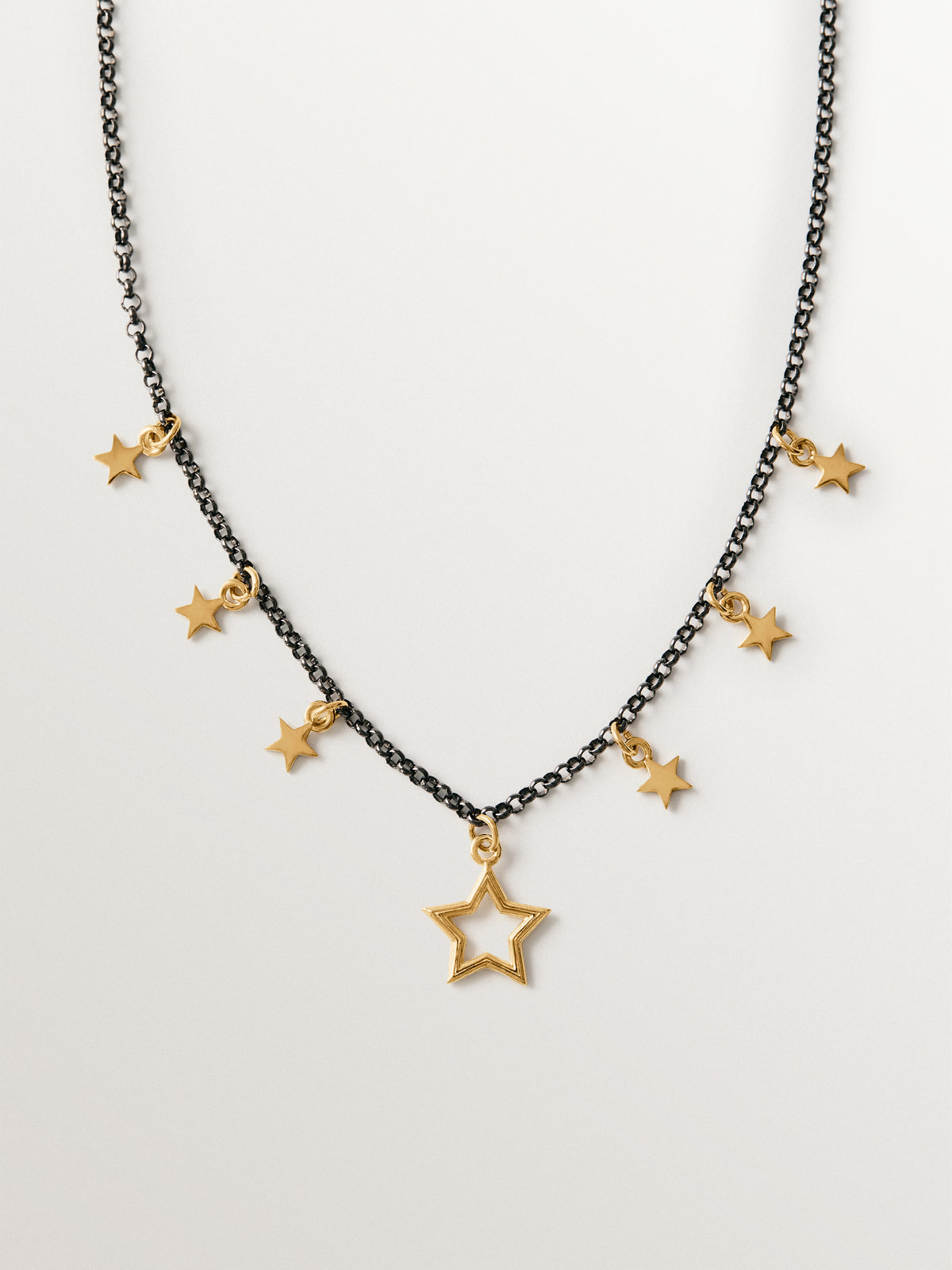 Two-tone necklace in 925 silver plated in 18K yellow gold with star motifs