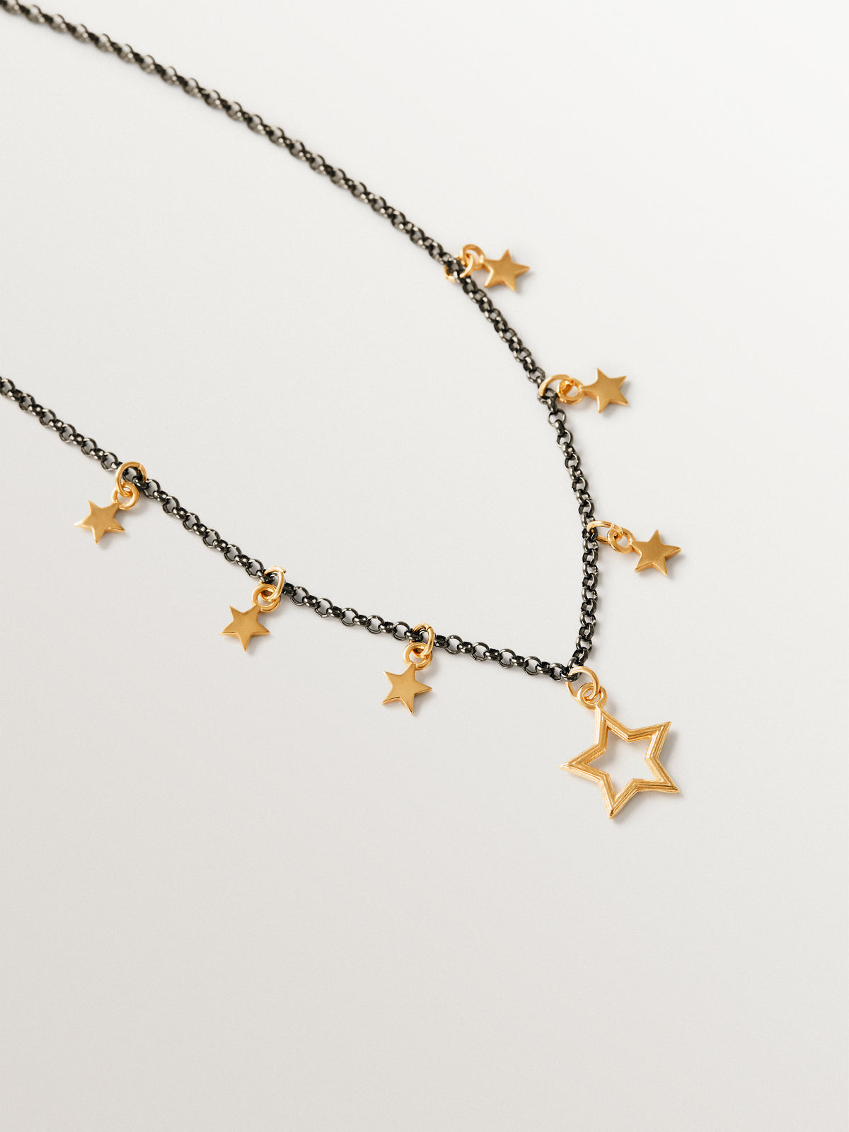 Two-tone necklace in 925 silver plated in 18K yellow gold with star motifs