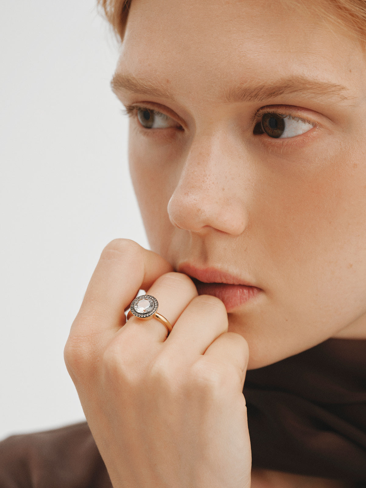 Two-tone 925 silver ring plated in 18K yellow gold with white topaz