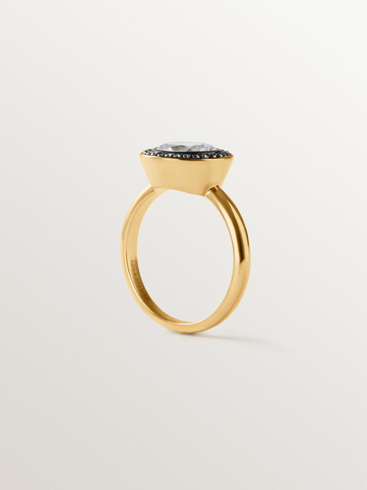 Two-tone 925 silver ring plated in 18K yellow gold with white topaz