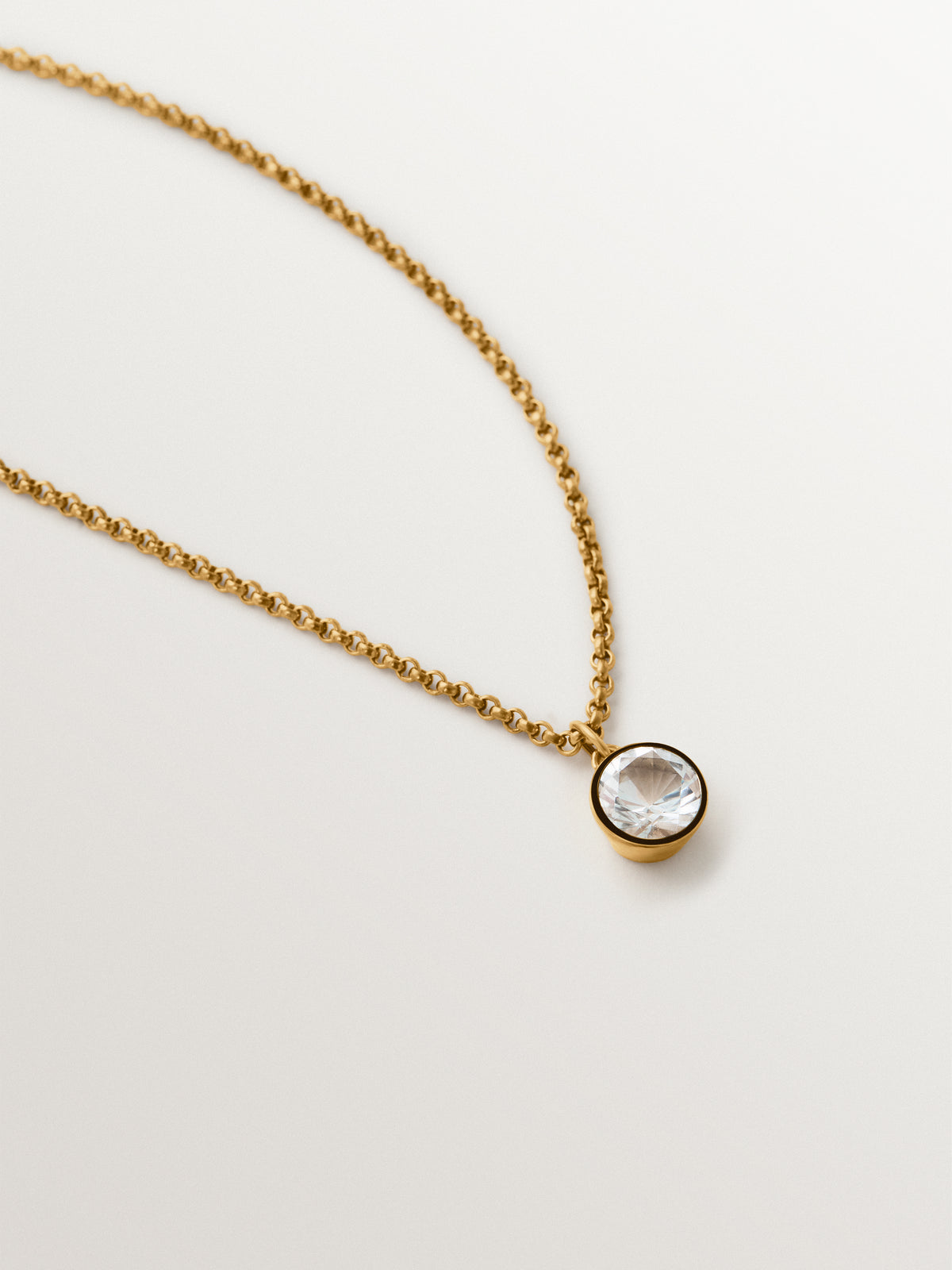 Two-tone necklace in 925 silver plated in 18K yellow gold with white topaz