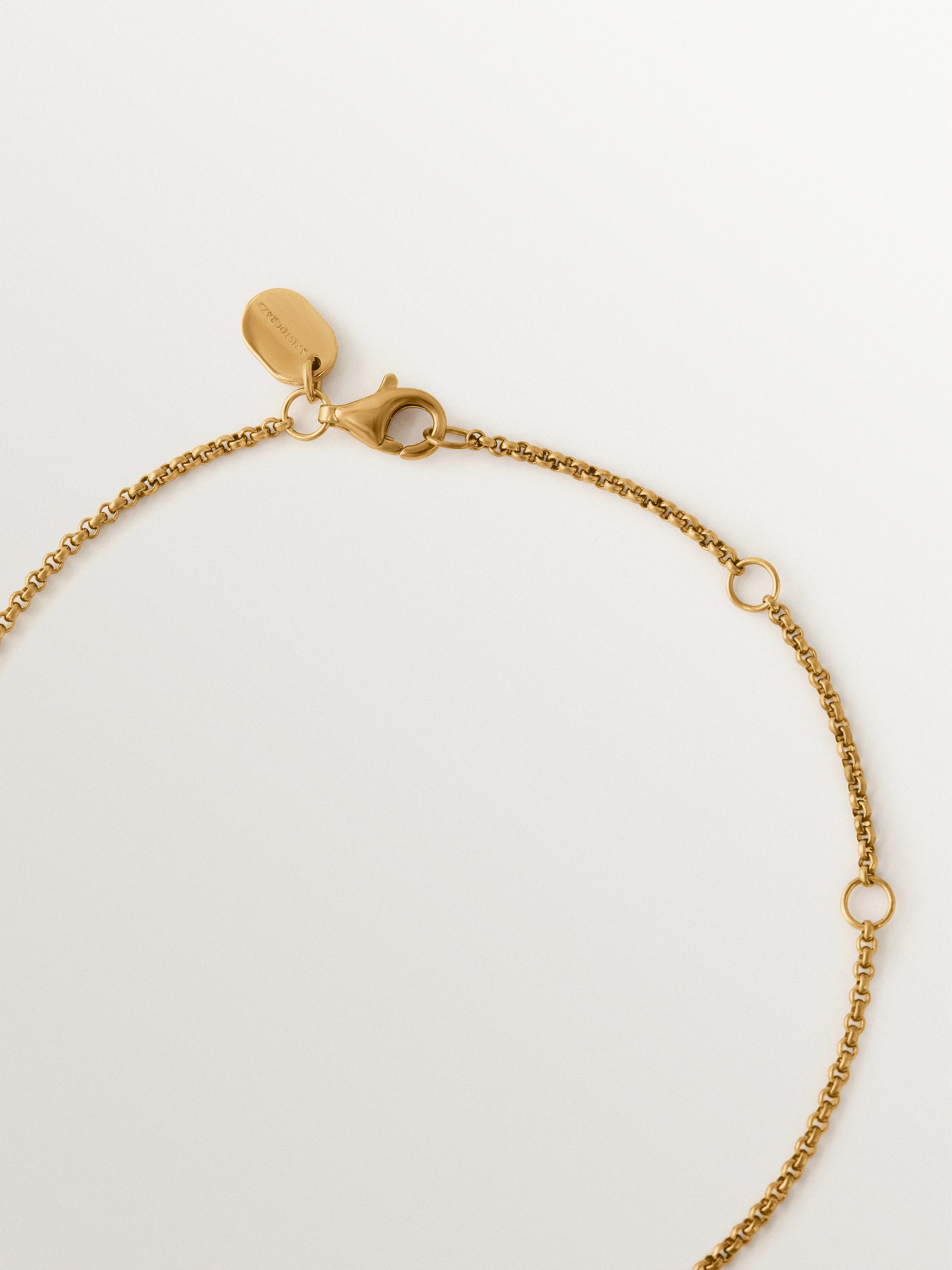 Two-tone necklace in 925 silver plated in 18K yellow gold with white topaz