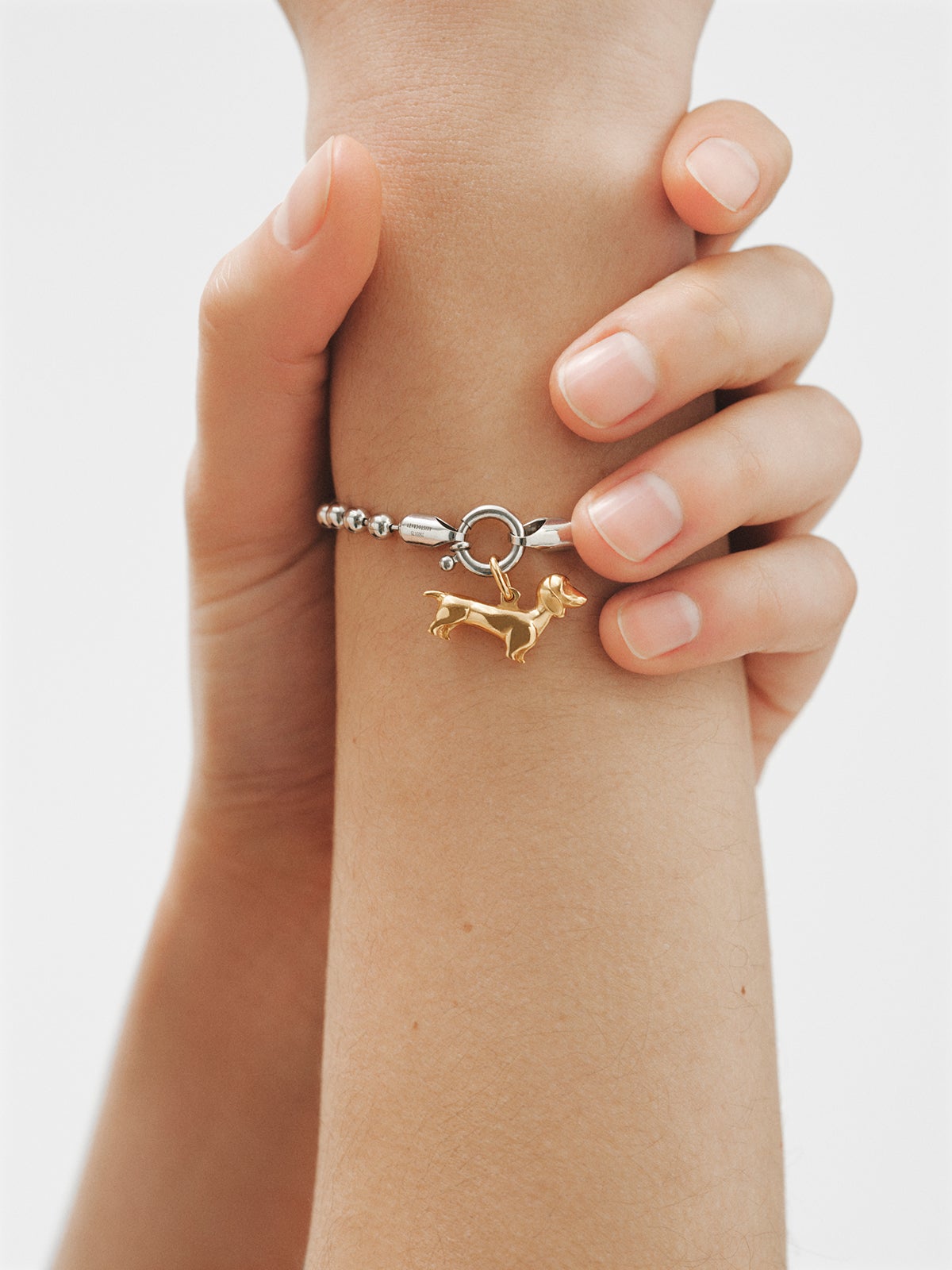 925 silver charm plated in 18K yellow gold in the shape of a dog