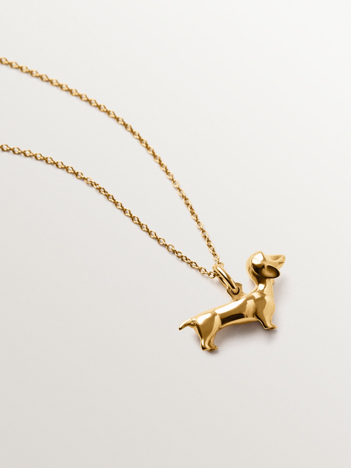925 silver charm plated in 18K yellow gold in the shape of a dog