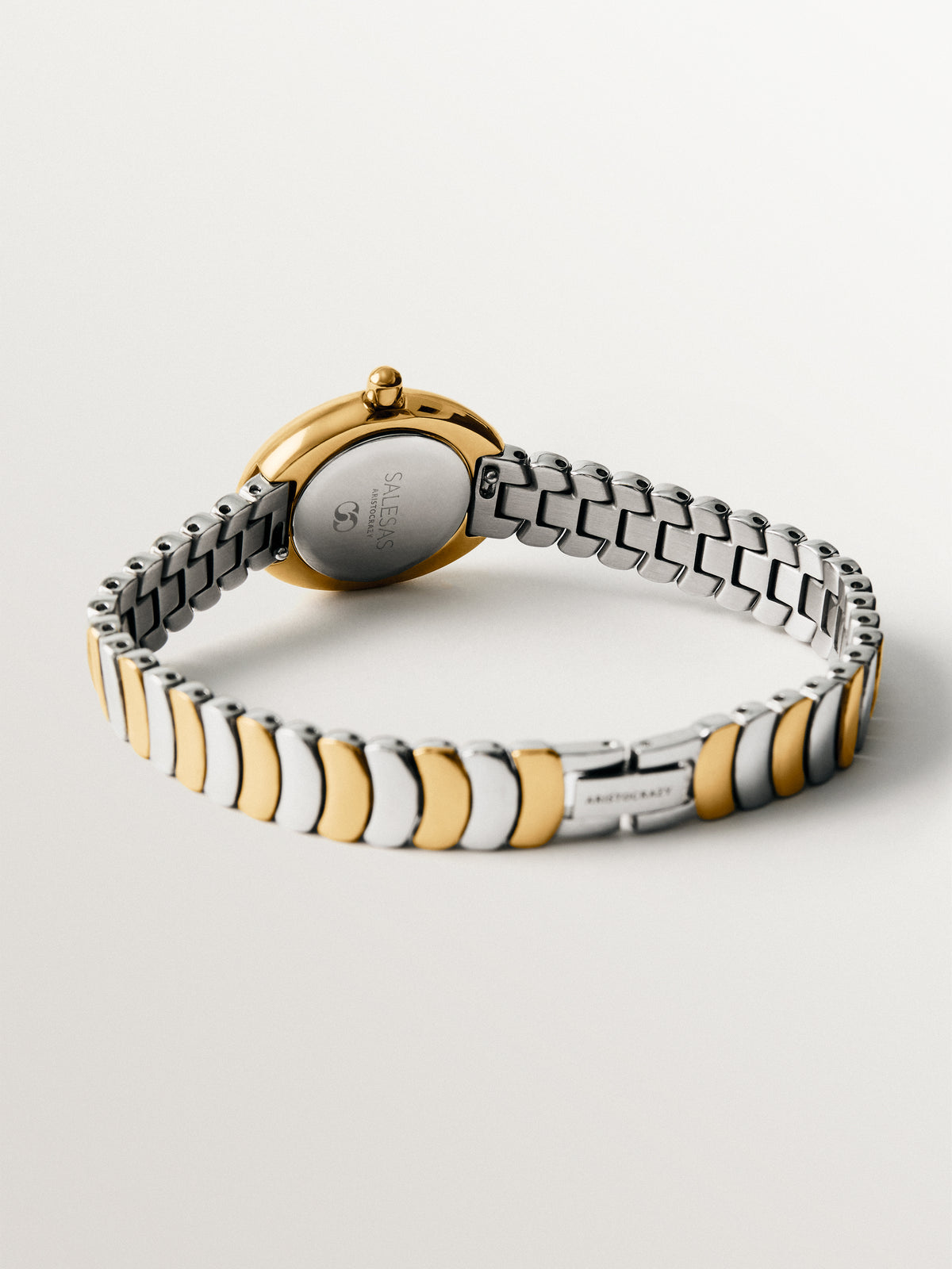 Salesas steel watch with white dial and two-tone strap