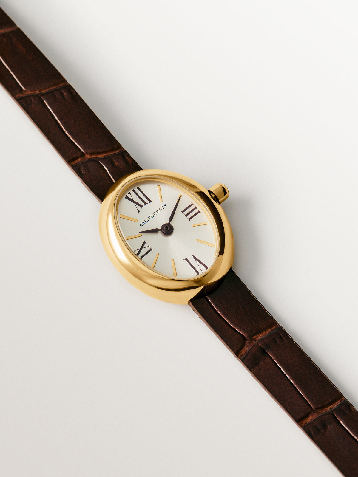 Salesas steel watch with white dial and brown leather strap